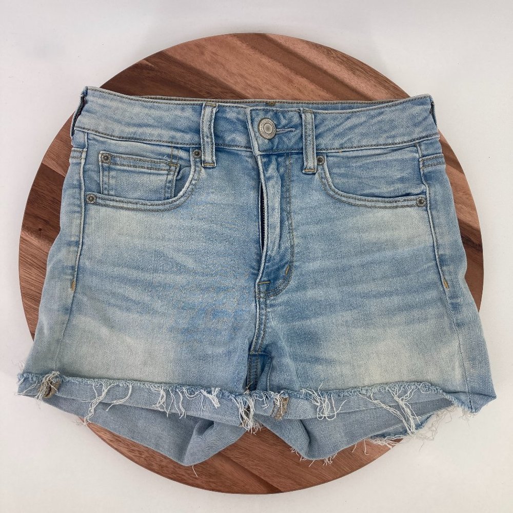 American Eagle Shorts High Rise Shortie Light Wash Distressed Stretch Size 6